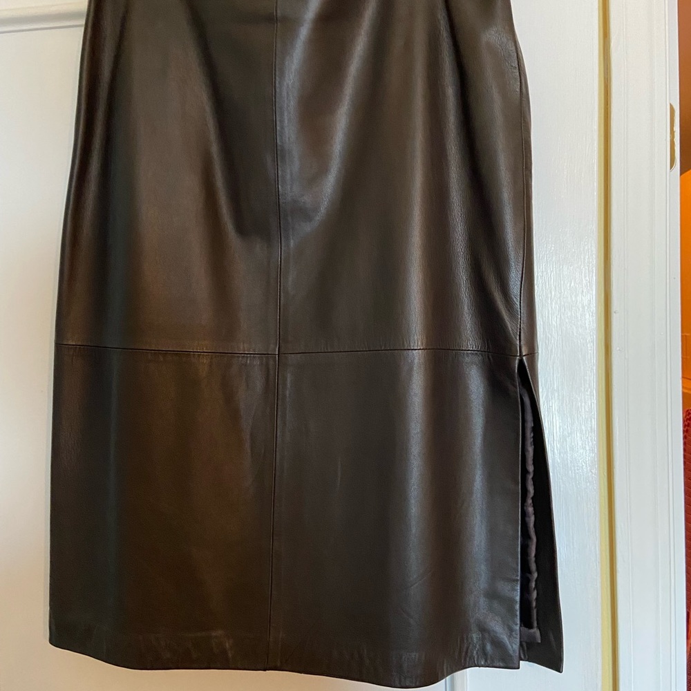 Adrienne Vittadini leather skirt with side slit. 26 inch length.